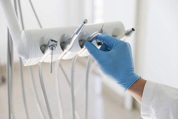 Professional Tooth Extraction technician working in Corcoran, MN